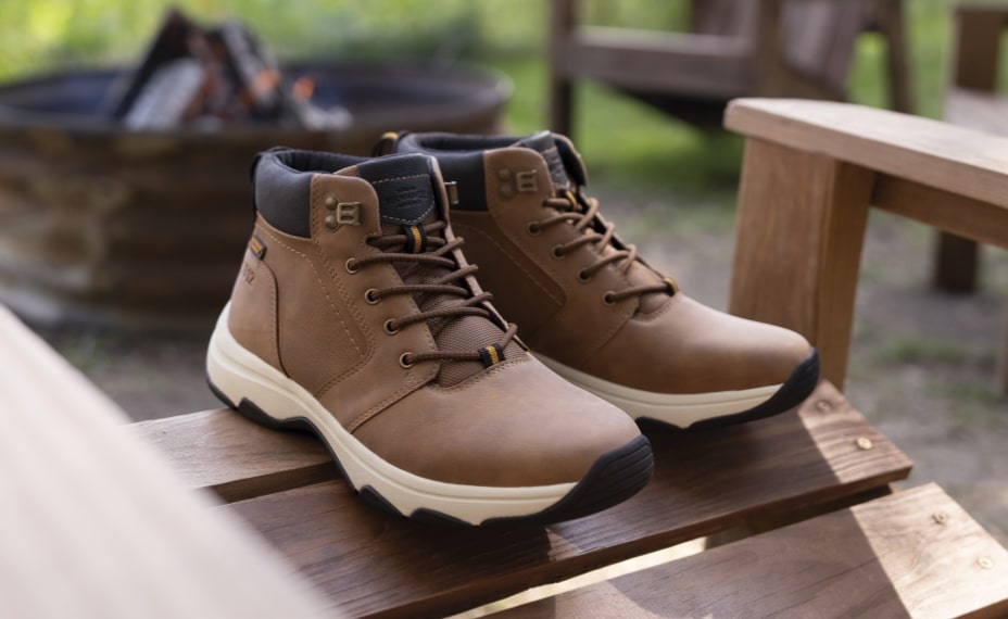 Click to shop Nunn Bush boots. Image features the Excavate boot in tan. 