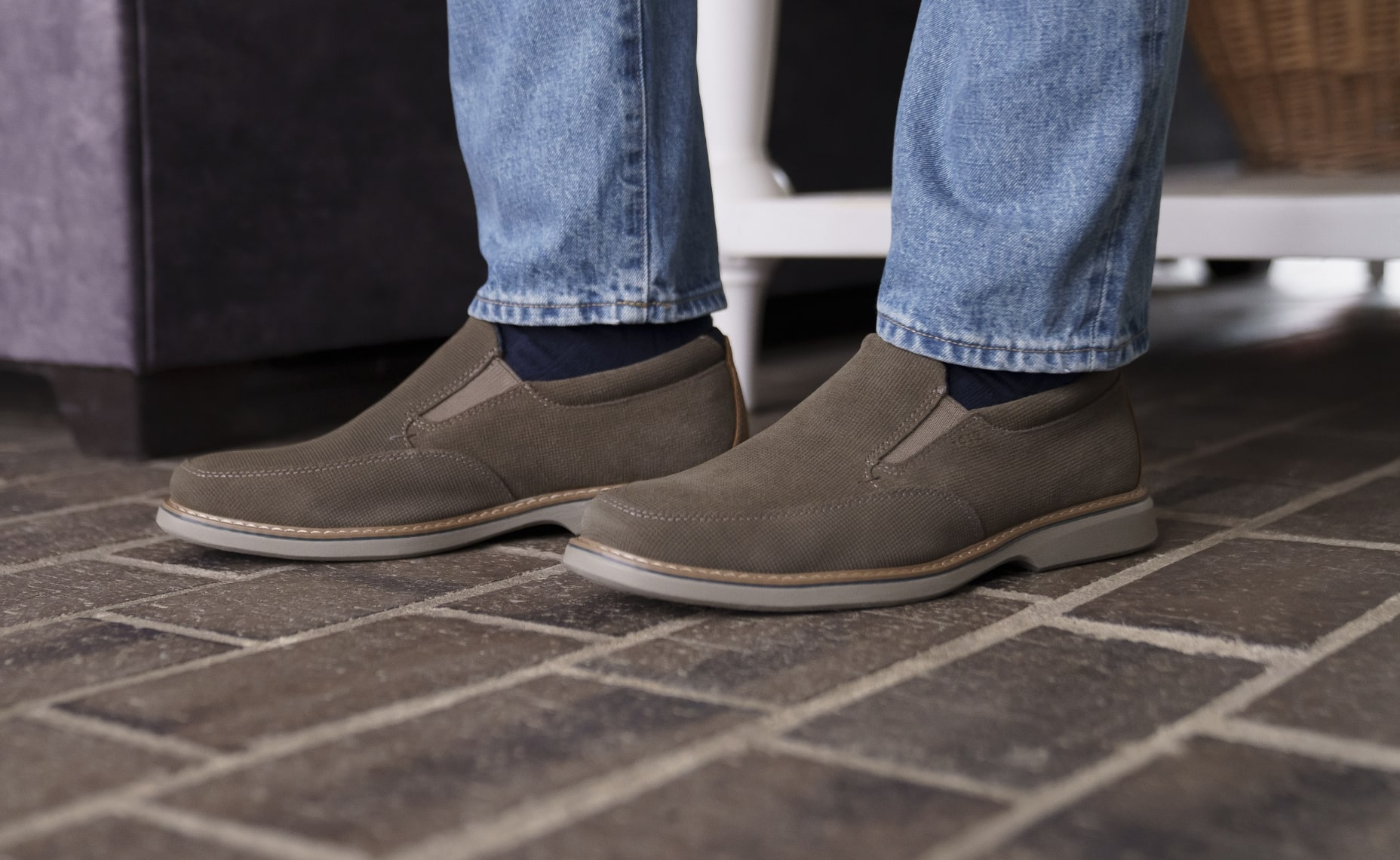 Click to shop Nunn Bush casual shoes. Image features the Otto slip on in mocha. 