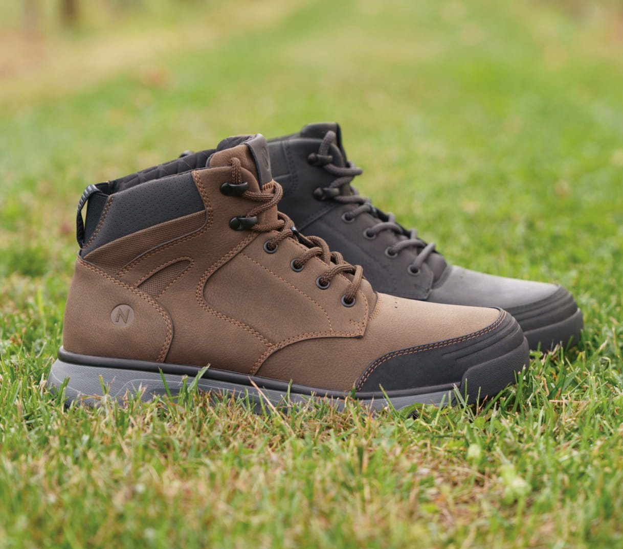 Shop Nunn Bush boots featuring the Sedona Moc Toe Boot in both colors in the grass.