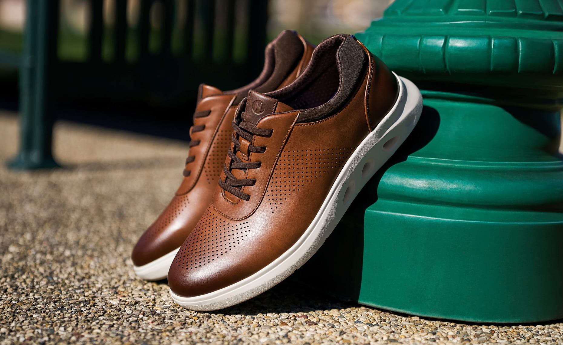 Shop Nunn Bush casuals featuring the Ponte Perf Toe Sneaker in cognac.