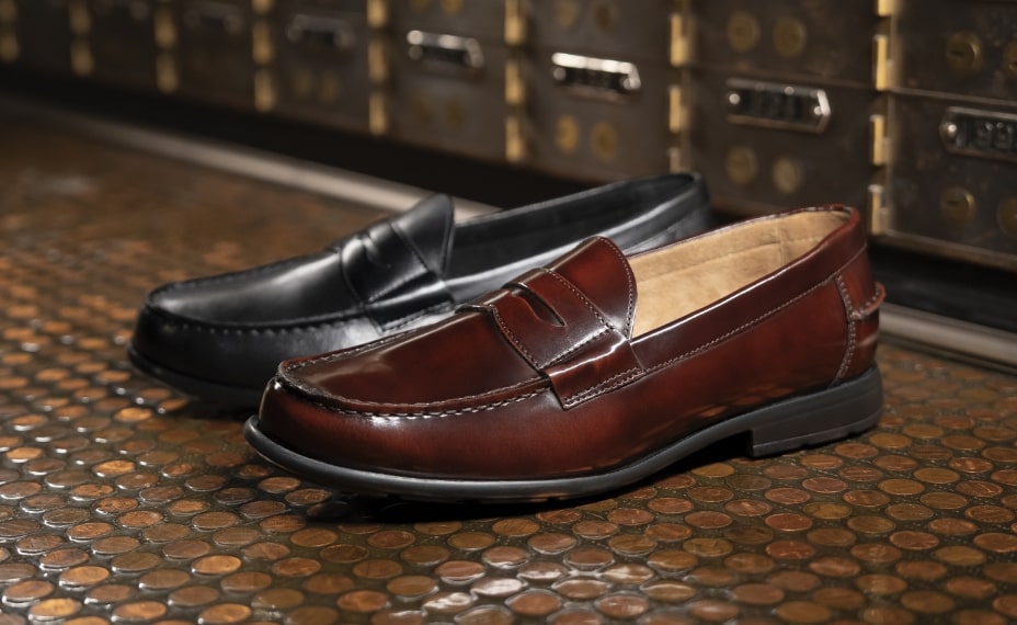 Click to shop Nunn Bush dress shoes. Image features the Drexel penny loafer. 