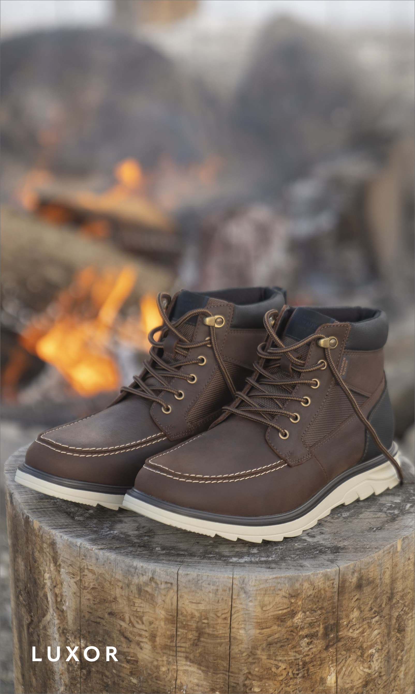 Men's Boots category. Image features the Luxor Moc Toe Boot in brown.