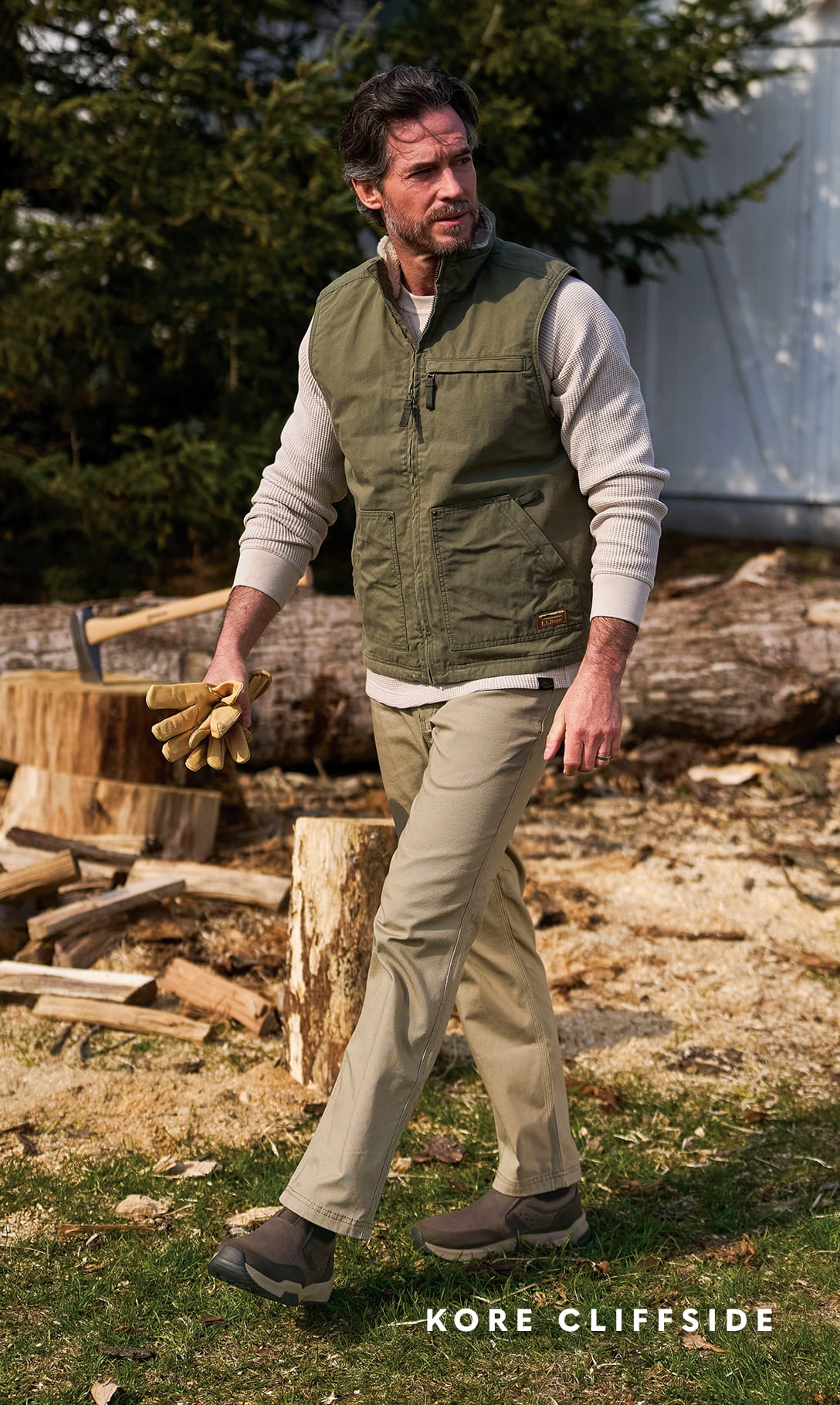Men's Newest Shoes category Image features the KORE Cliffside in brown outside by wood.