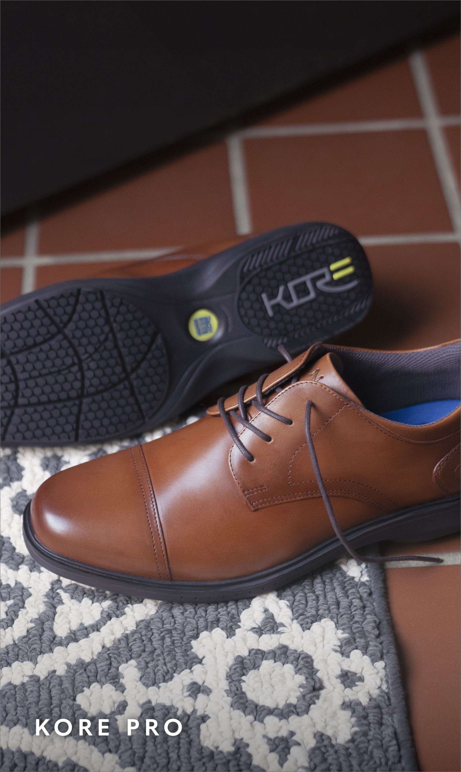 Men's Dress Shoes category. Image features the Kore Pro Cap Toe Oxford in cognac. 