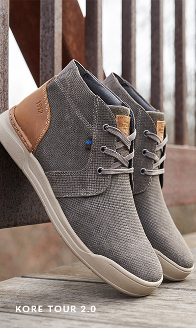 Men's Dress Shoes category. The image features the KORE Tour 2.0 Plain Toe Chukka in Gray.